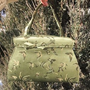 Retro style pistachio silk handbag